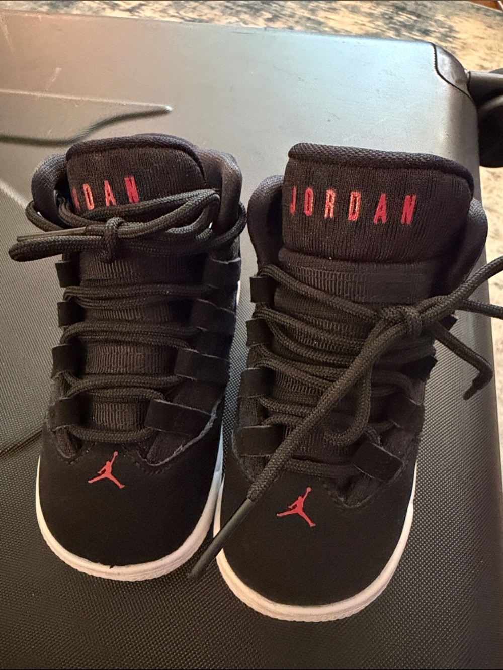 Jordan Kids Black Sneakers with Red Jumpman Accent